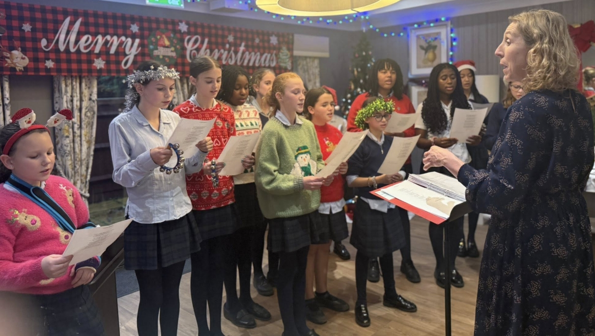 Tudor Hall School Performing Christmas Carols for Residents 