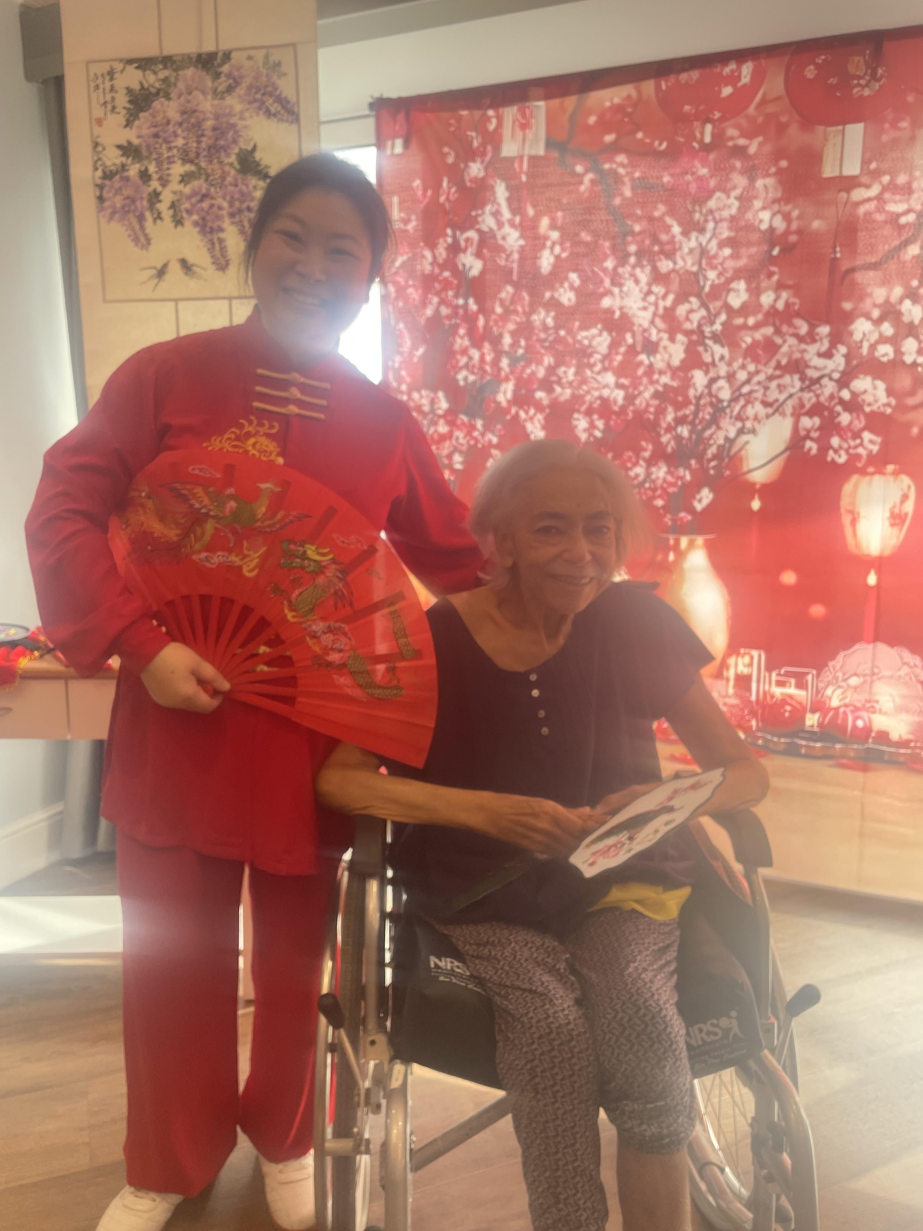 Faustina Yang with the Homes residents