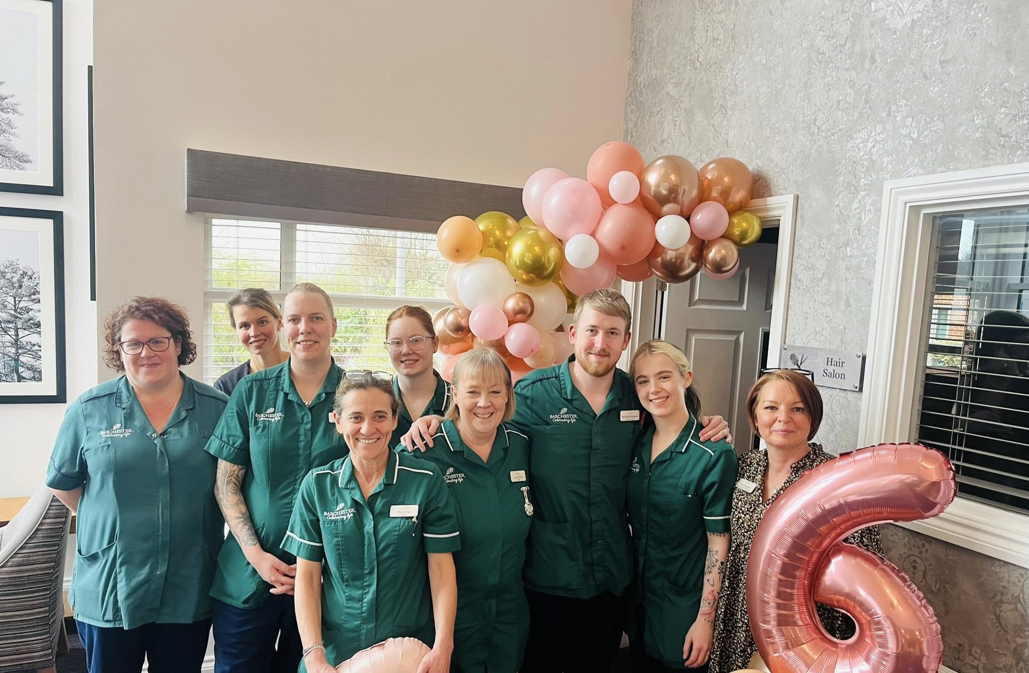 Denmead Grange staff with a giant 6 balloon
