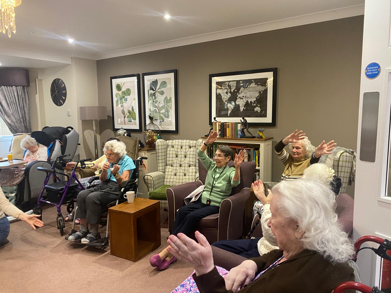 Generations come together when Boogie Beats bring children to play with the residents