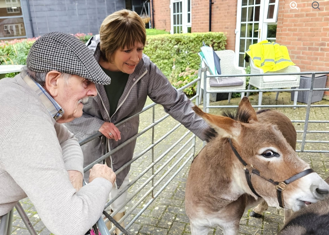 Residents Enjoy Donkey Visit to Home