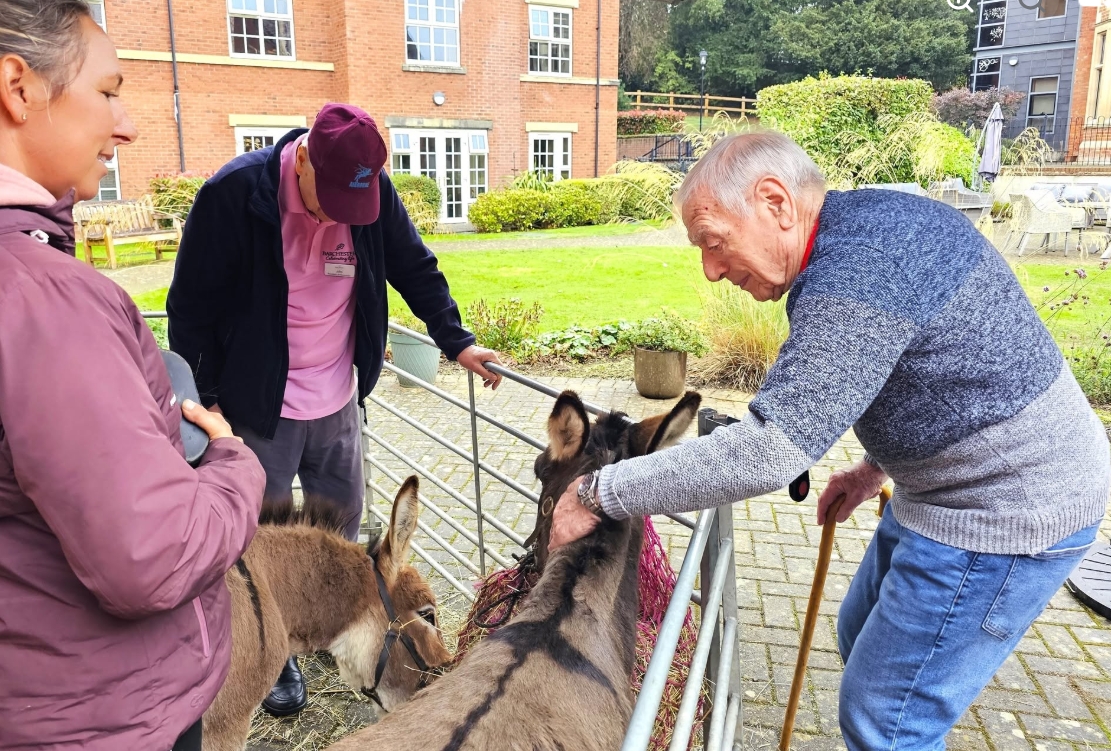 Residents Enjoy Donkey Visit to Home