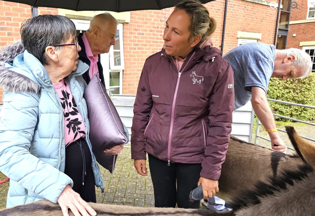 Residents Enjoy Donkey Visit to Home