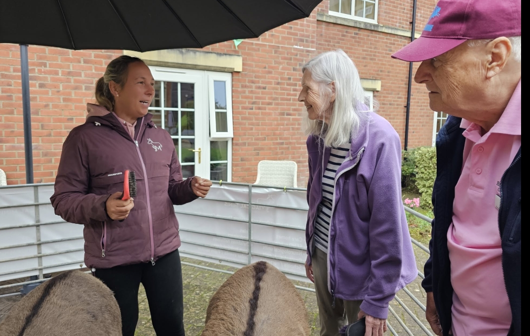 Residents Enjoy Donkey Visit to Home