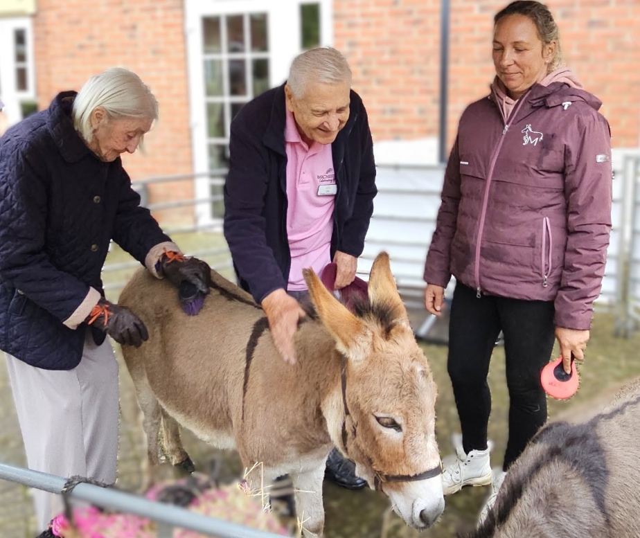 Residents Enjoy Donkey Visit to Home