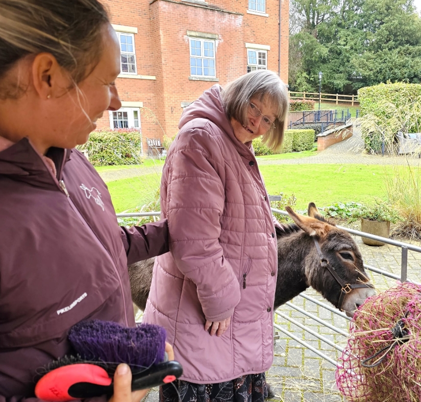 Residents Enjoy Donkey Visit to Home