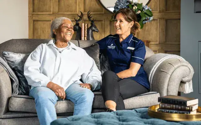 A resident and a nurse at a nursing care home