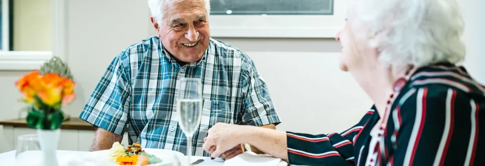 Man and woman enjoying afternoon tea