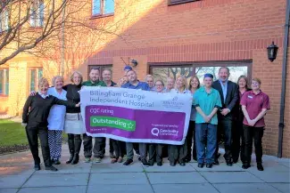 Billingham Grange staff with CQC banner