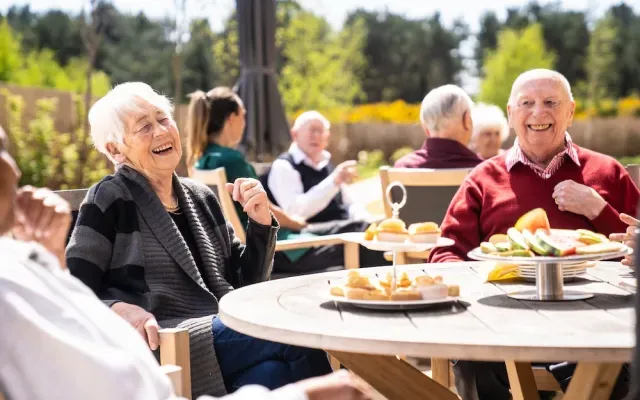 Residents laughing together