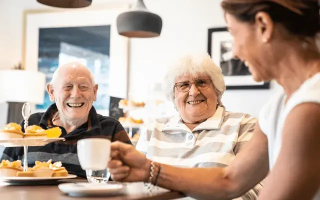 Residents laughing
