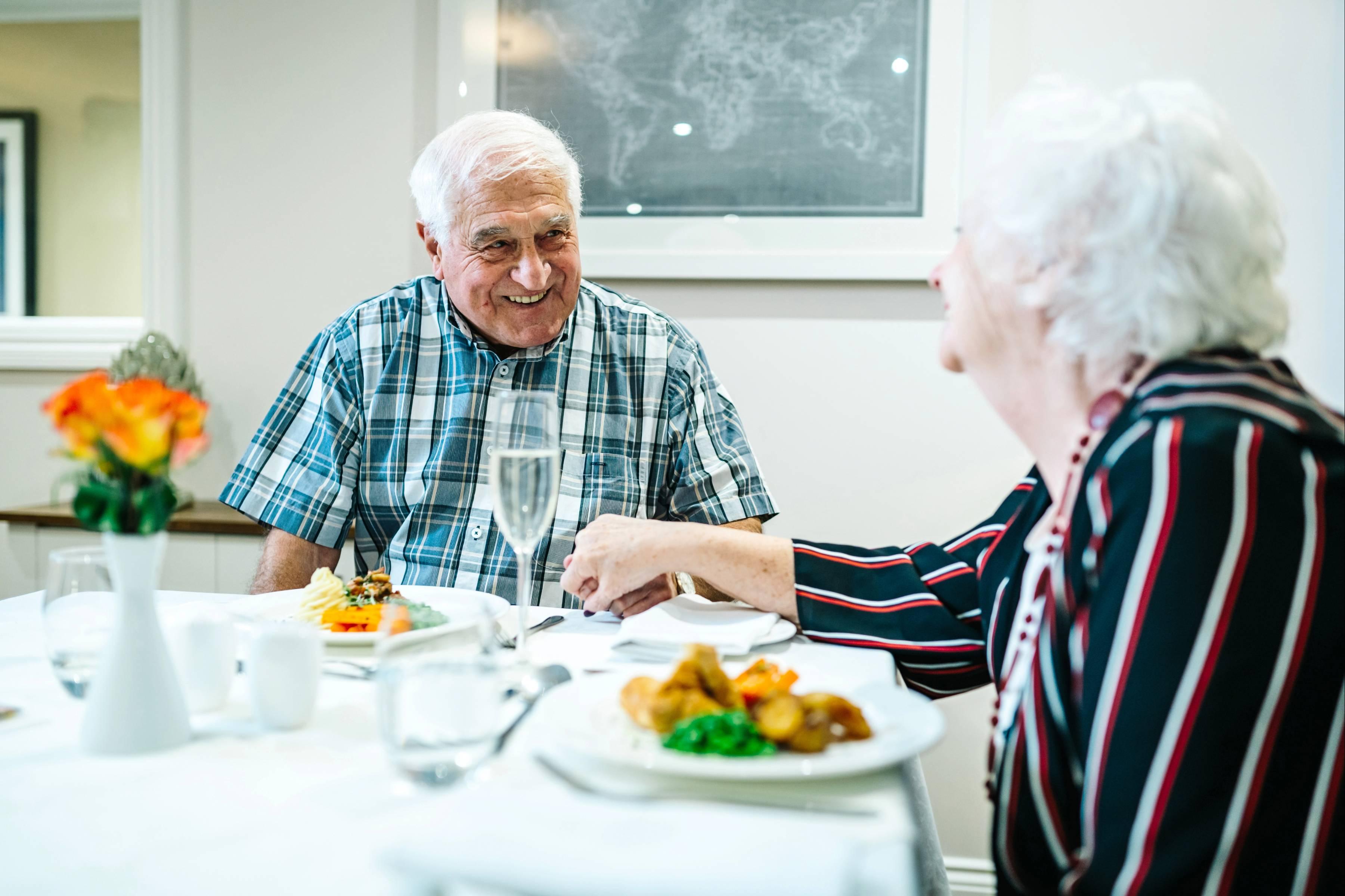 Residents eating a meal