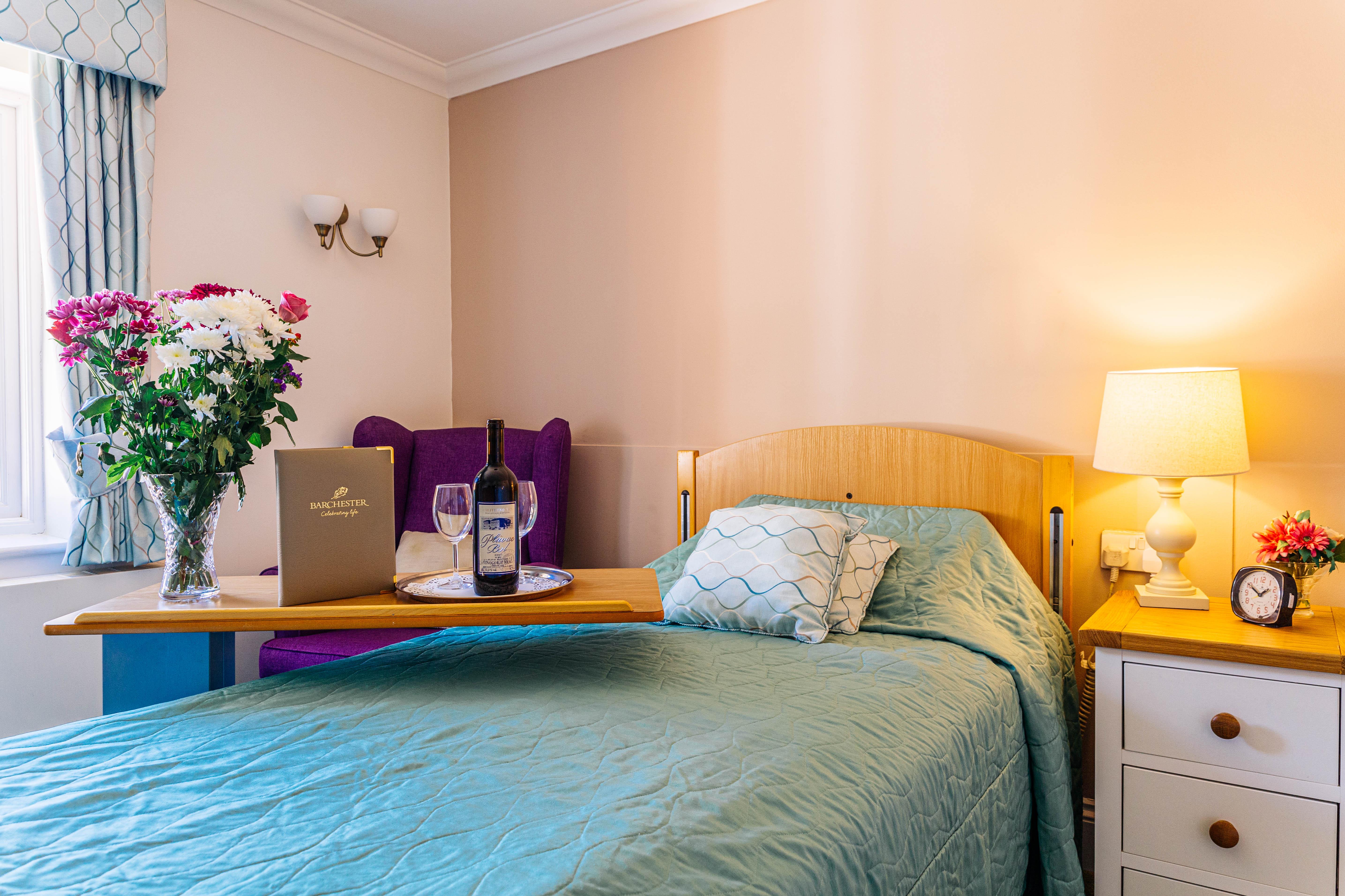 Bedroom at Badgeworth Court care home in Cheltenham