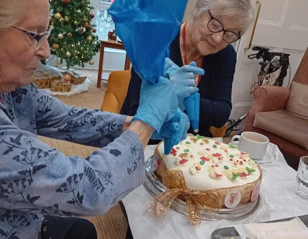Decorating Gingerbread House Cake
