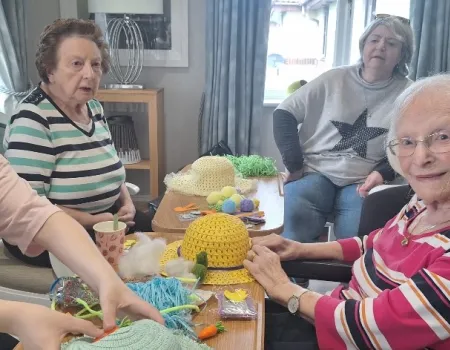 Intergenerational bonnet making 