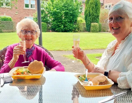 Residents, families and friends enjoy BBQ 
