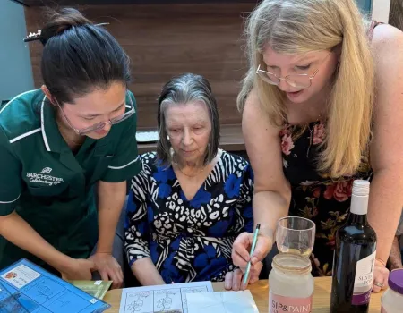 A Creative Afternoon: Residents Enjoy ‘Sip and Paint’ with Michelle