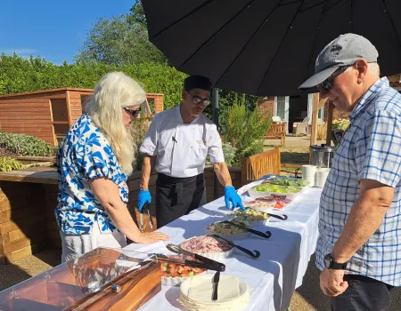 Residents Celebrate Summer at Lotus Manor with BBQ and Garden Games