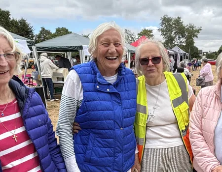 Resident Representative presents charity cheque