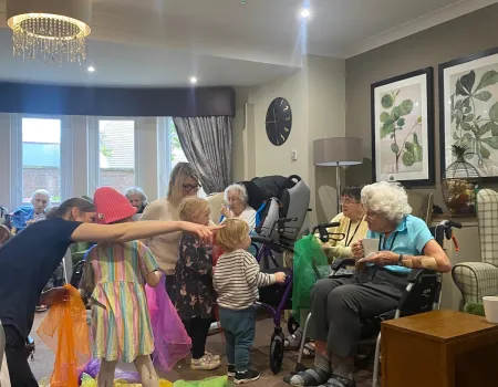 Generations come together when Boogie Beats bring children to play with the residents