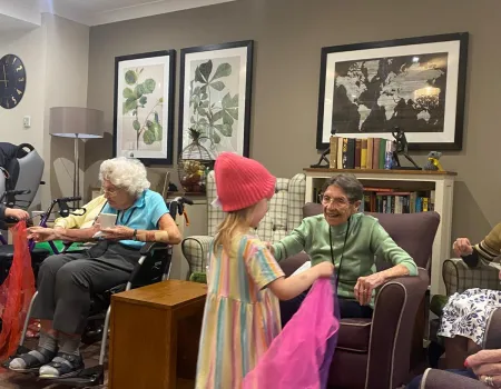Generations come together when Boogie Beats bring children to play with the residents