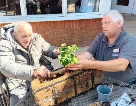 Gardening club with head of maintenance Gary