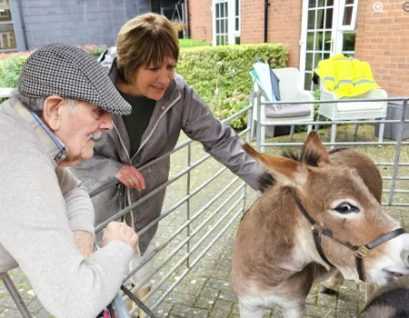 Residents Enjoy Donkey Visit to Home