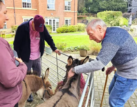 Residents Enjoy Donkey Visit to Home