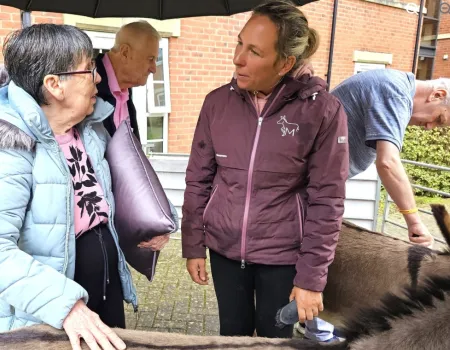 Residents Enjoy Donkey Visit to Home