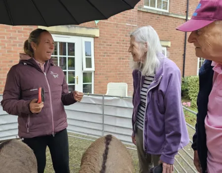 Residents Enjoy Donkey Visit to Home