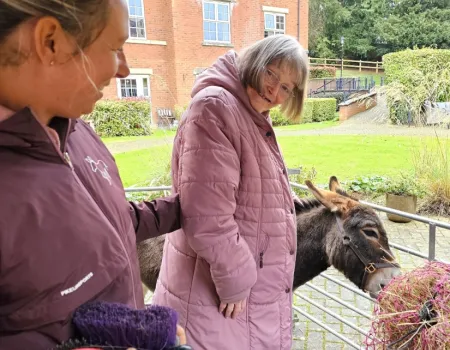 Residents Enjoy Donkey Visit to Home