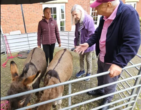 Residents Enjoy Donkey Visit to Home
