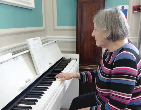 Resident entertains on the piano