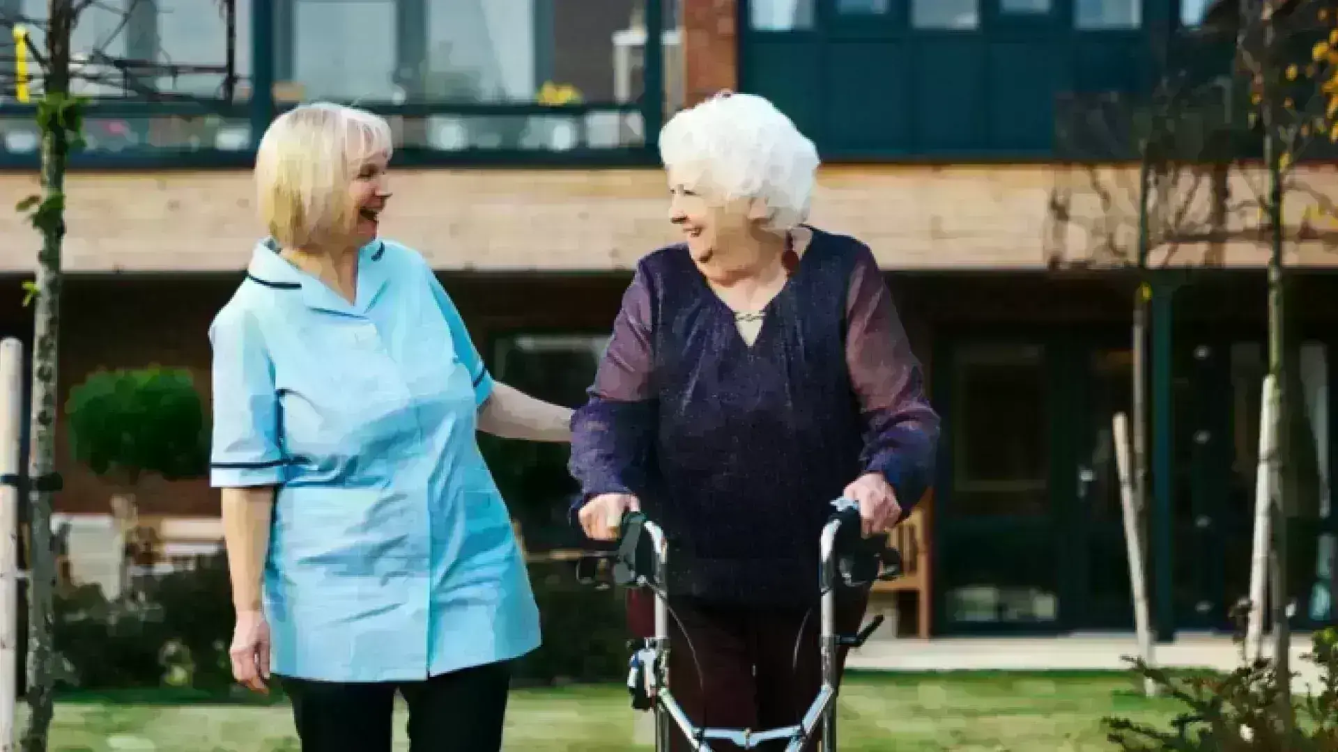 Carer and resident walking 