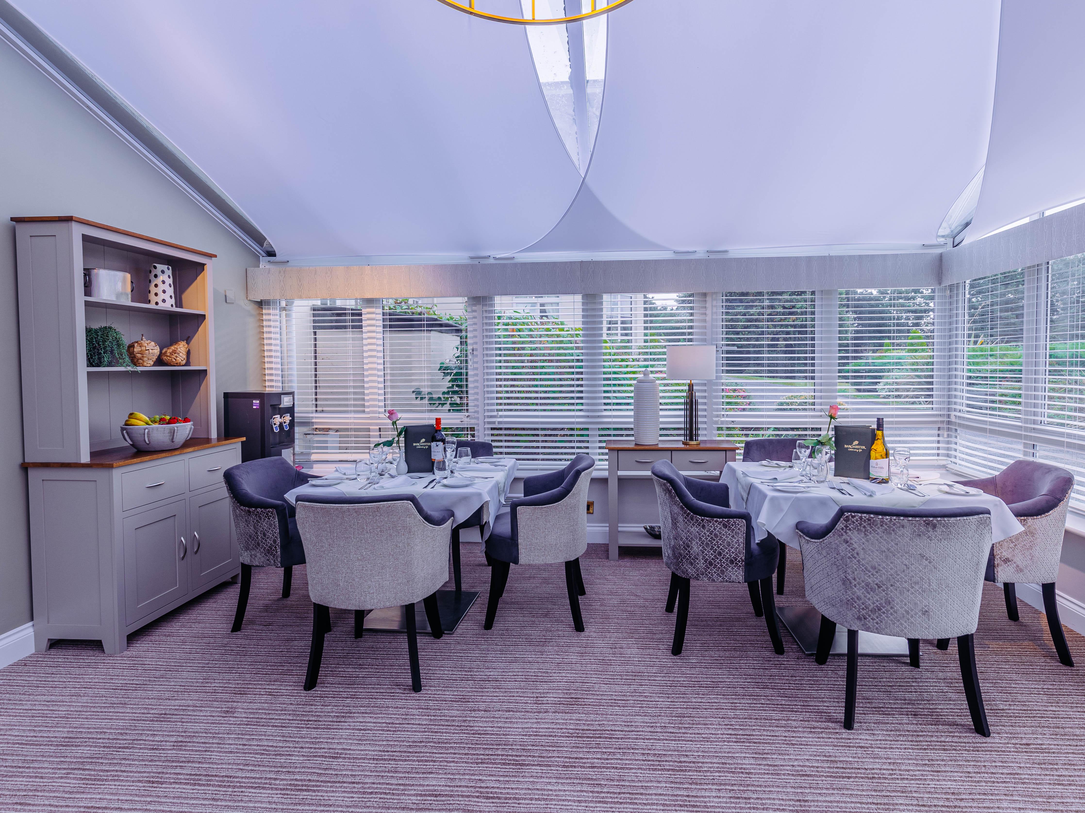 Dining Room at Bushey House Beaumont Care Home in Watford