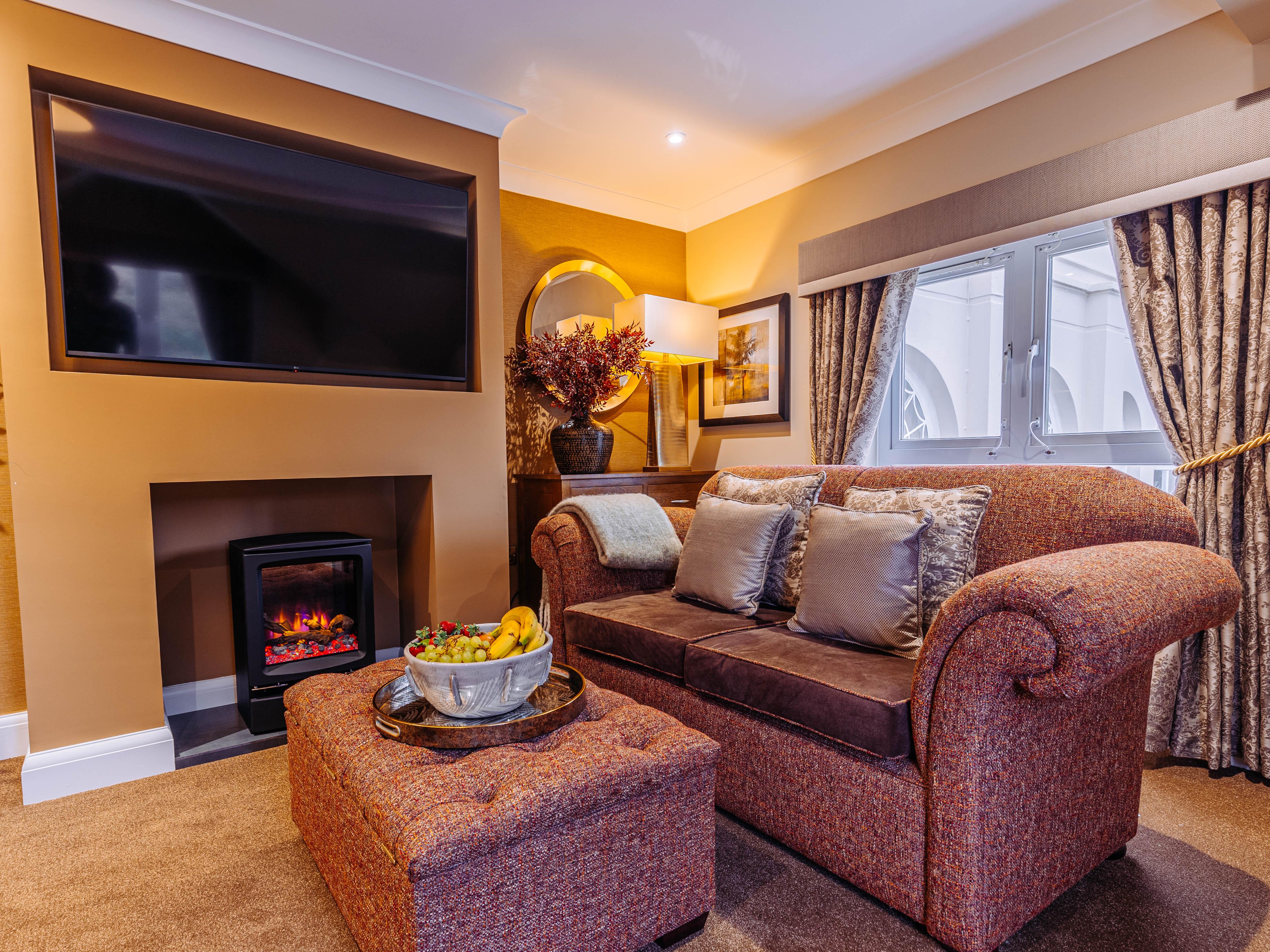 Lounge at Bushey House Beaumont Care Home in Watford
