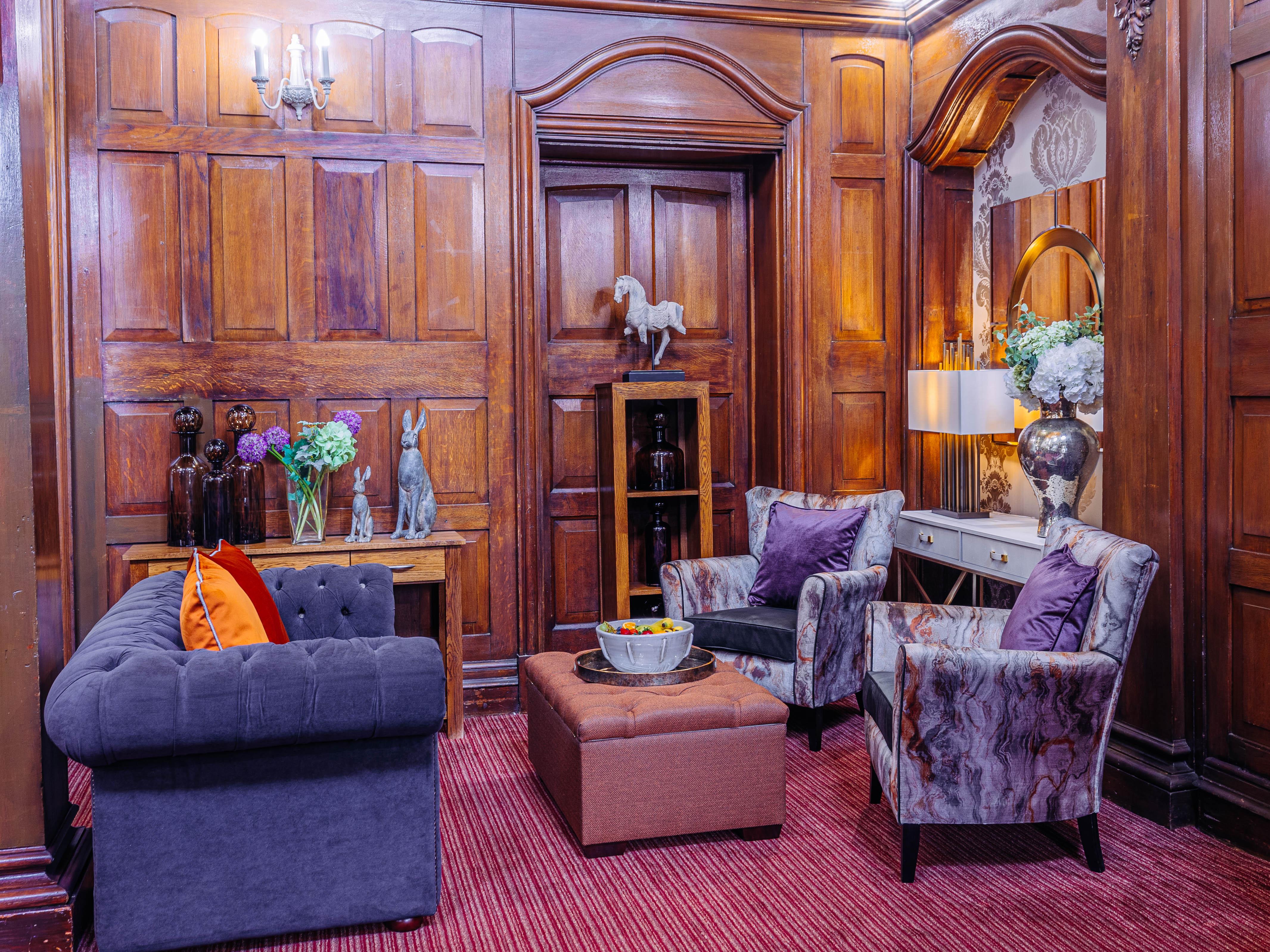 Lounge at Bushey House Beaumont Care Home in Watford