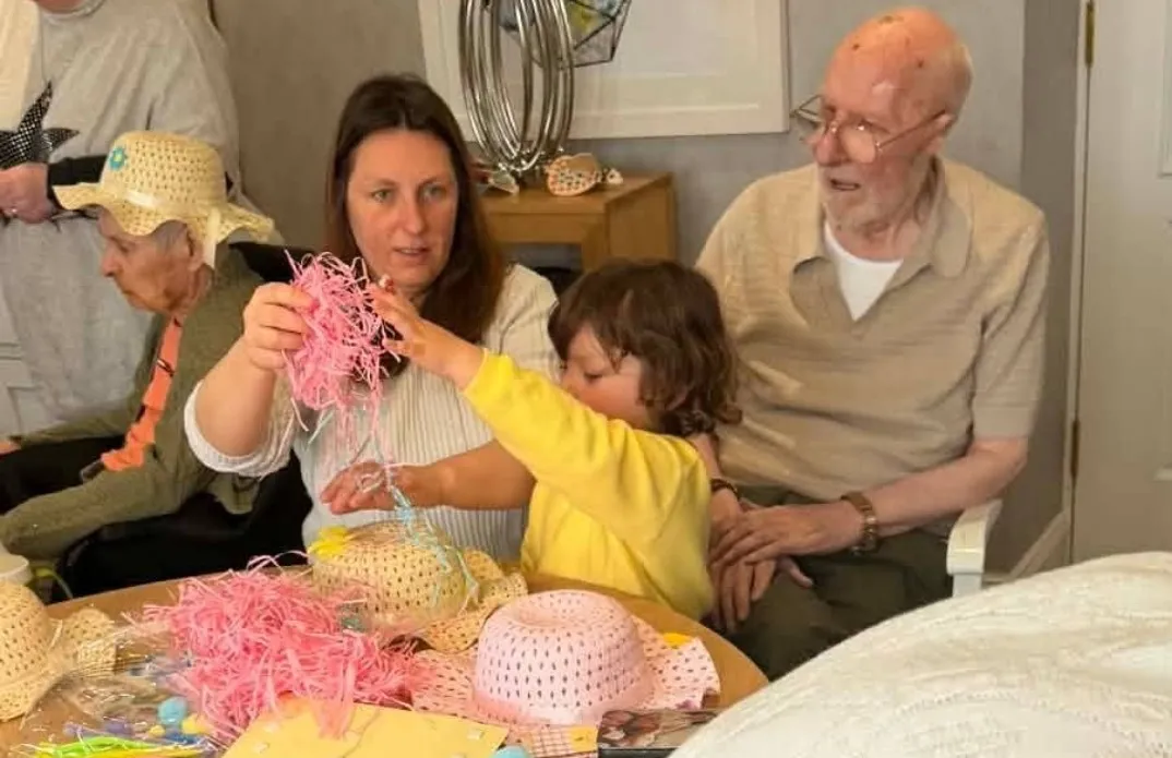 Intergenerational bonnet making