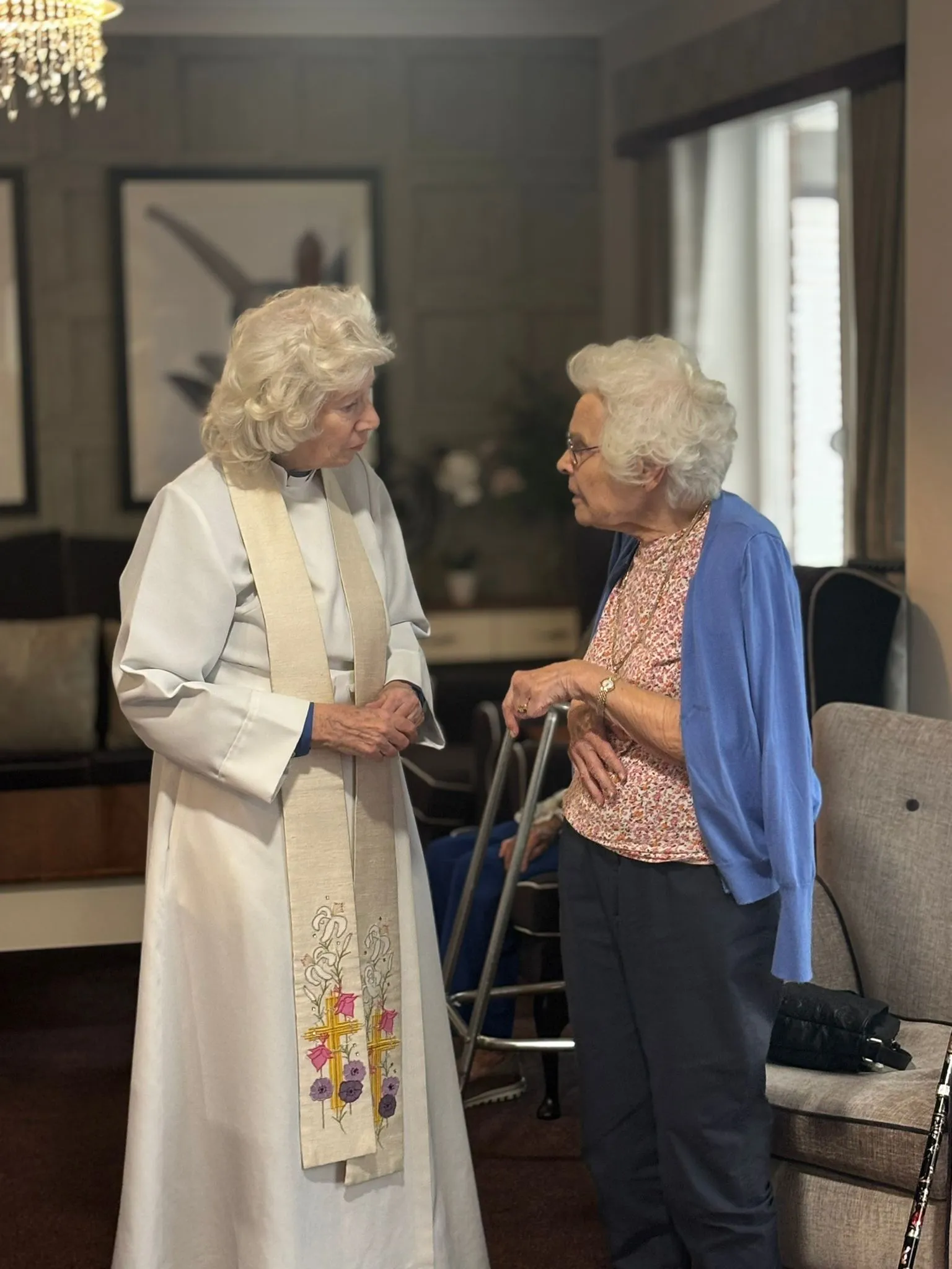 A visit from our local priest    