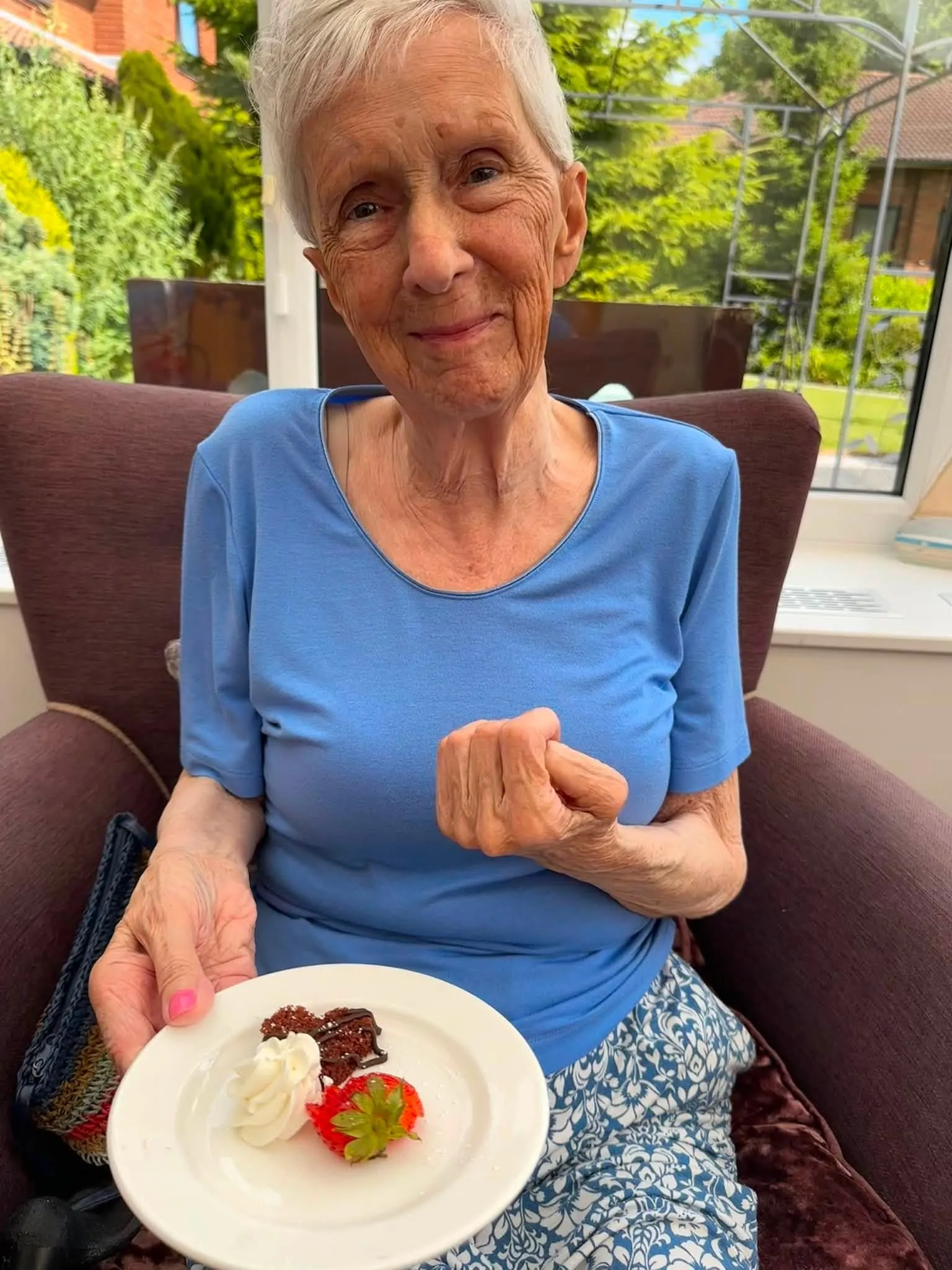 Serving up strawberries and cream 